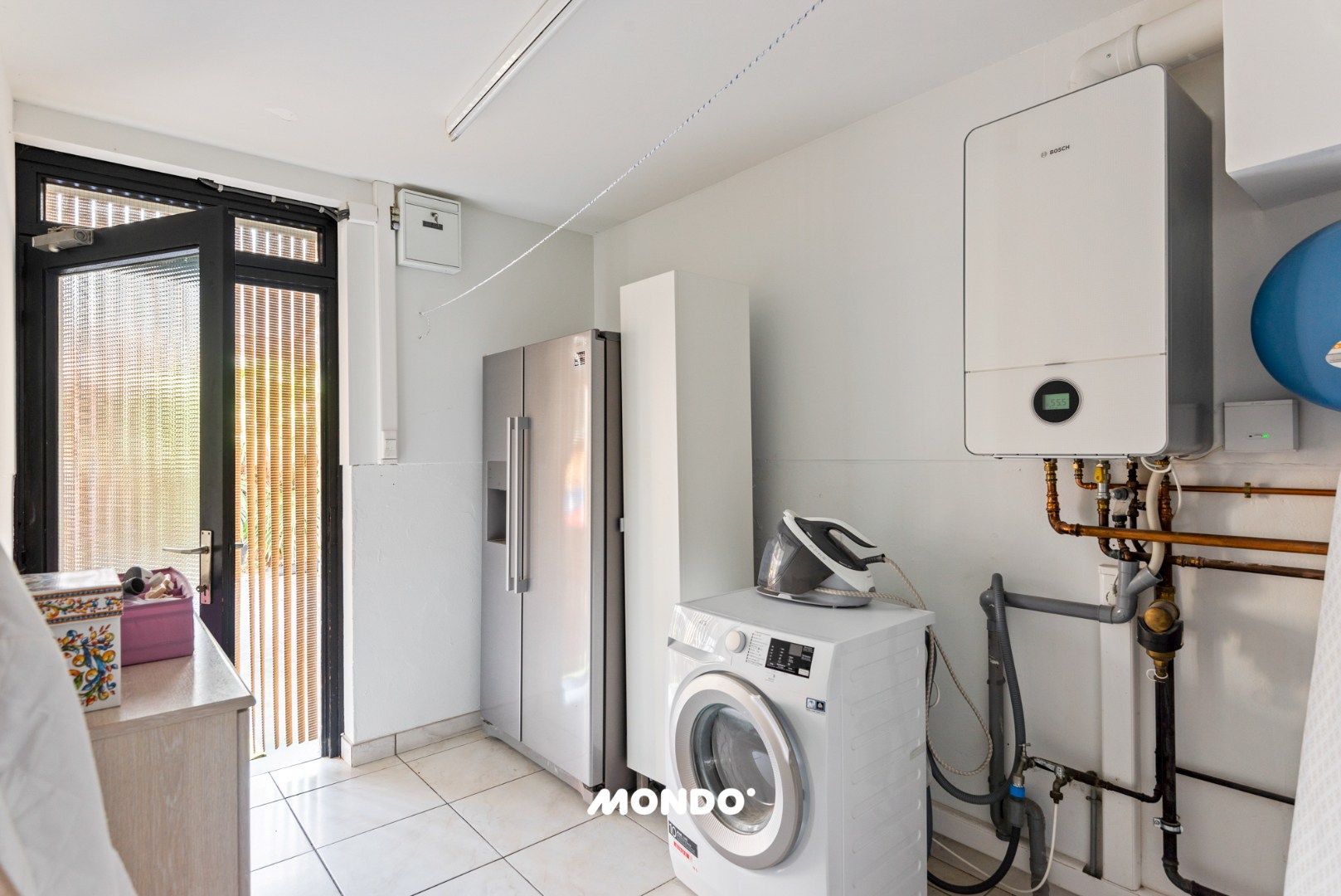 Ruime gezinswoning met 3 slaapkamers en lichtrijke aanbouw in een rustige doodlopende straat! foto 12