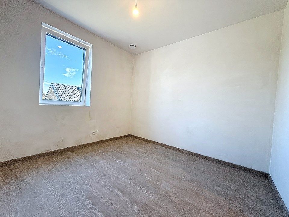 Prachtige half-open nieuwbouwwoning met carport in het centrum van Westrozebeke foto 7