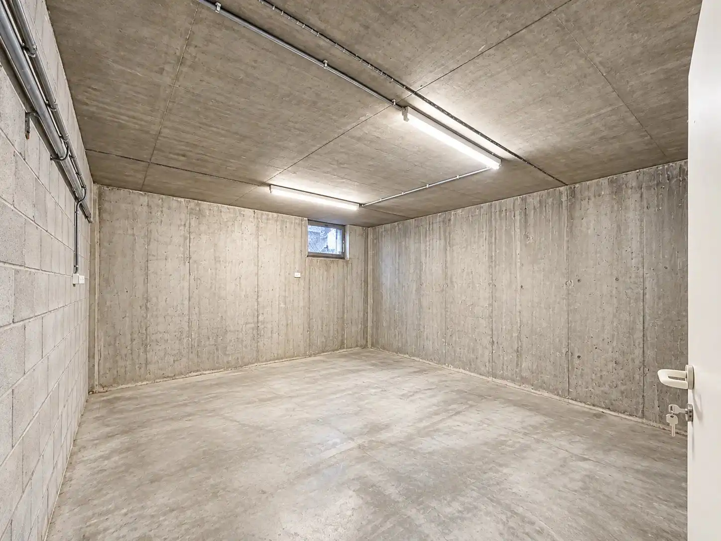 Ruim appartement met 2 slaapkamers, 2 staanplaatsen en 3 kelders foto 34