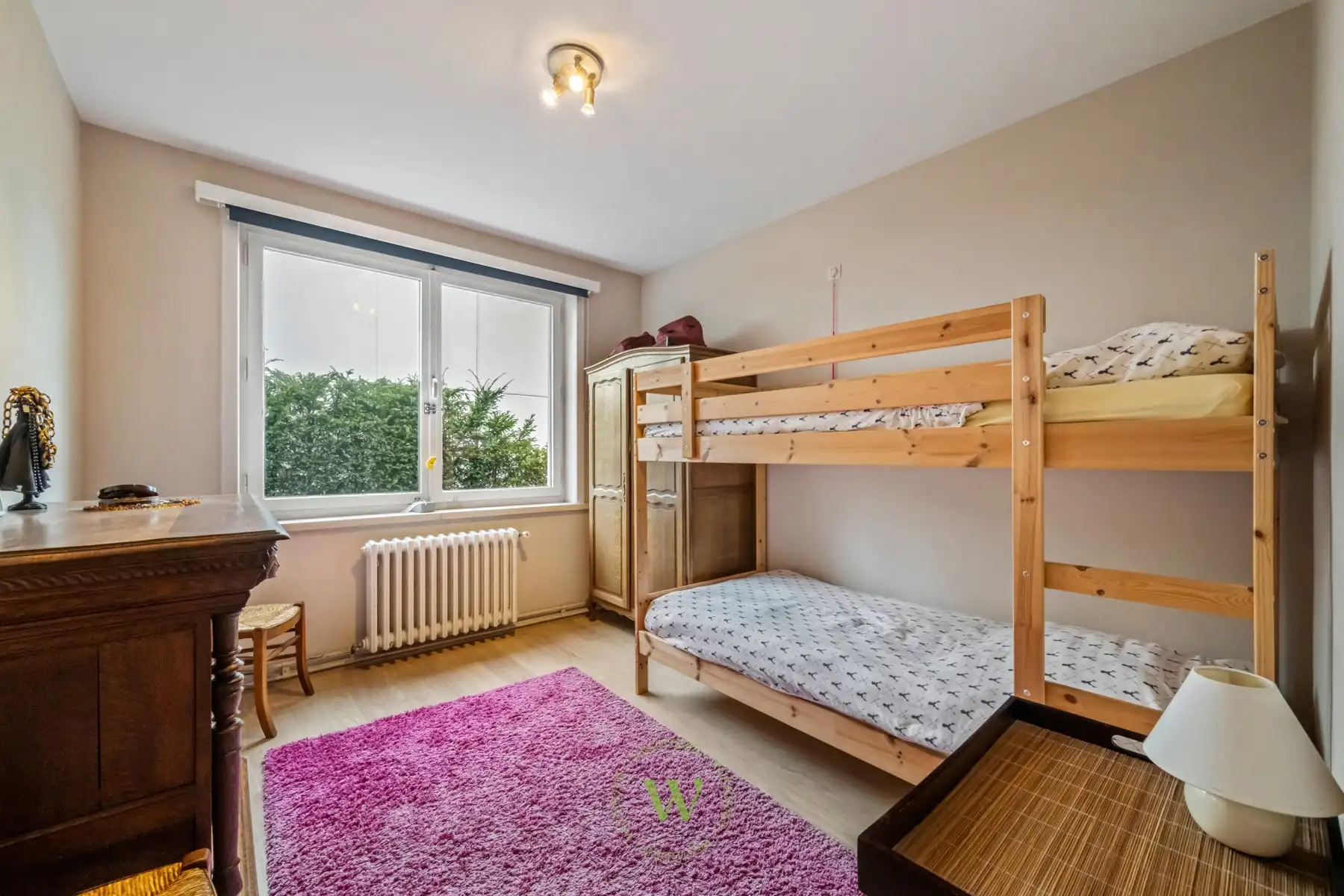 Lichtrijk 3-slaapkamerappartement met 2 garages en berging foto 17