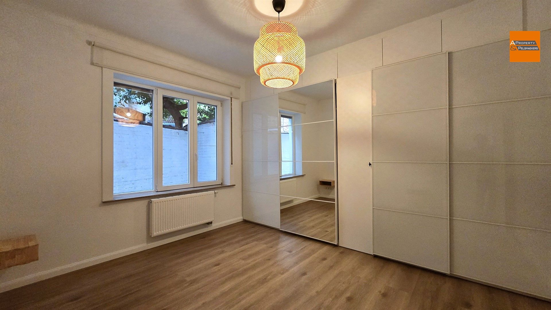 Opgefrist gelijkvloersappartement in Etterbeek foto 14