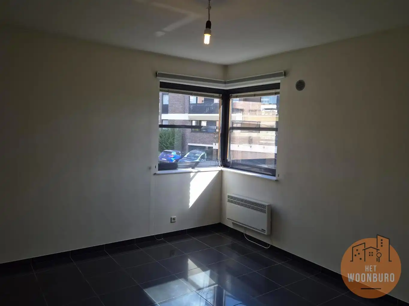 Ruim appartement met kelder en 2 autostaanplaatsen foto 15