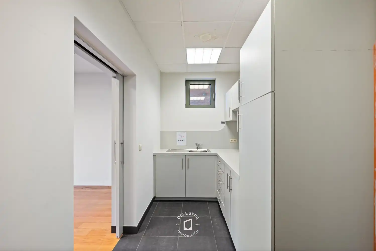 Veelzijdig investeringspand met 3 APP., MAGAZIJN, STAANPLAATSEN EN HANDELSPAND foto 15