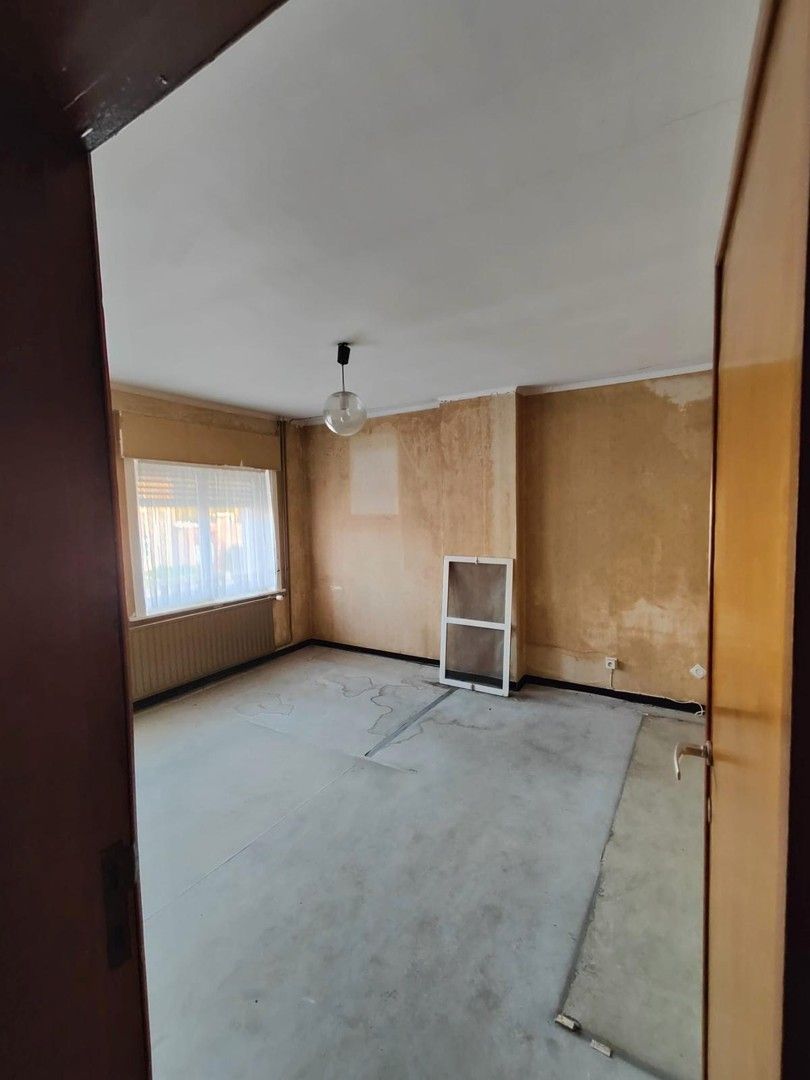 Woning met loods en voormalige showroom foto 7