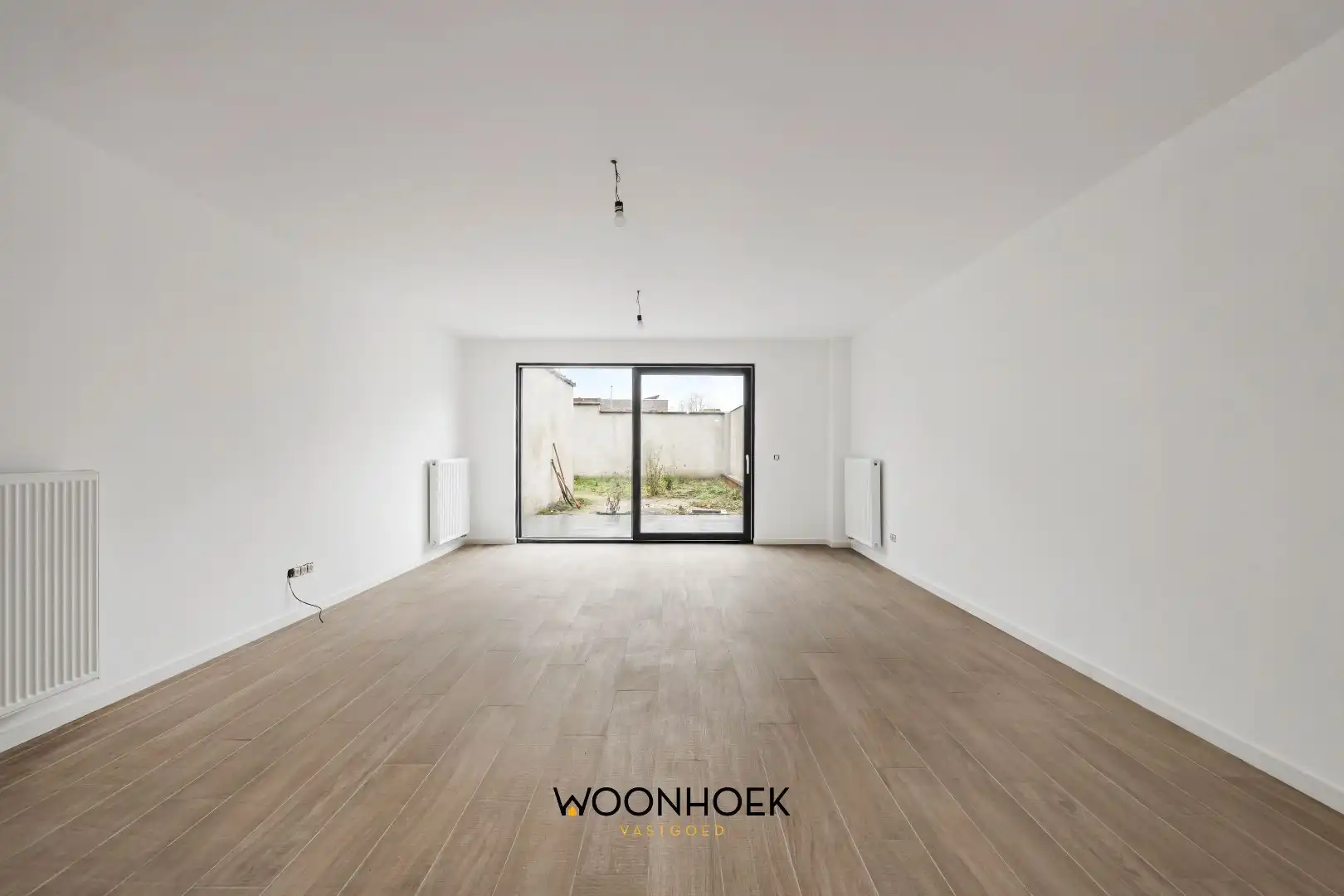 Gerenoveerde, 4-slpk woning met 2 badkamers en tuin! foto 4