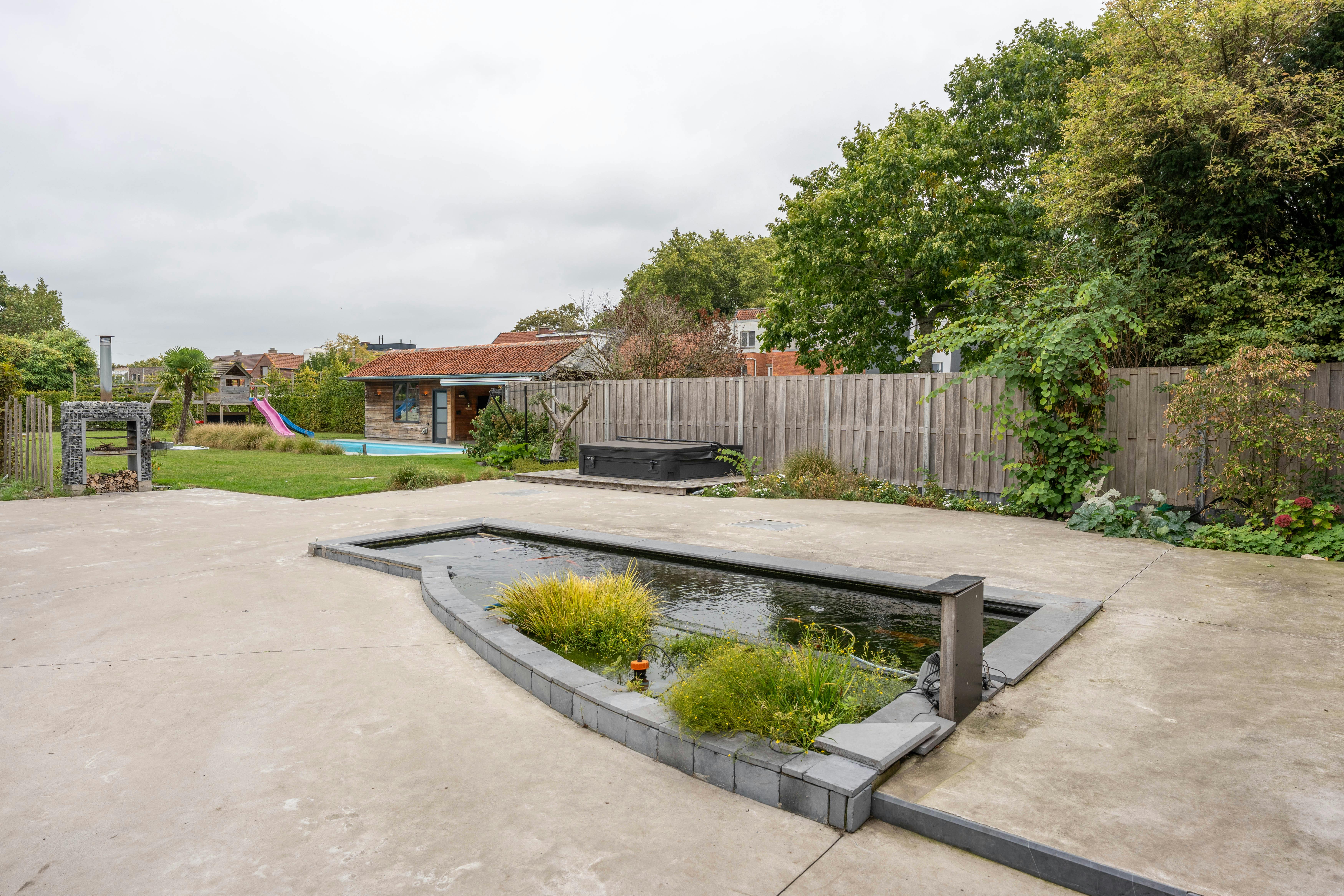 Moderne villa met zwembad en atelier te koop in Evergem foto 10