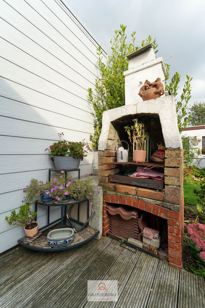 COMPROMIS IN OPMAAK! Charmante halfopen woning met oprit, tuin én garage te koop nabij UZ foto 15