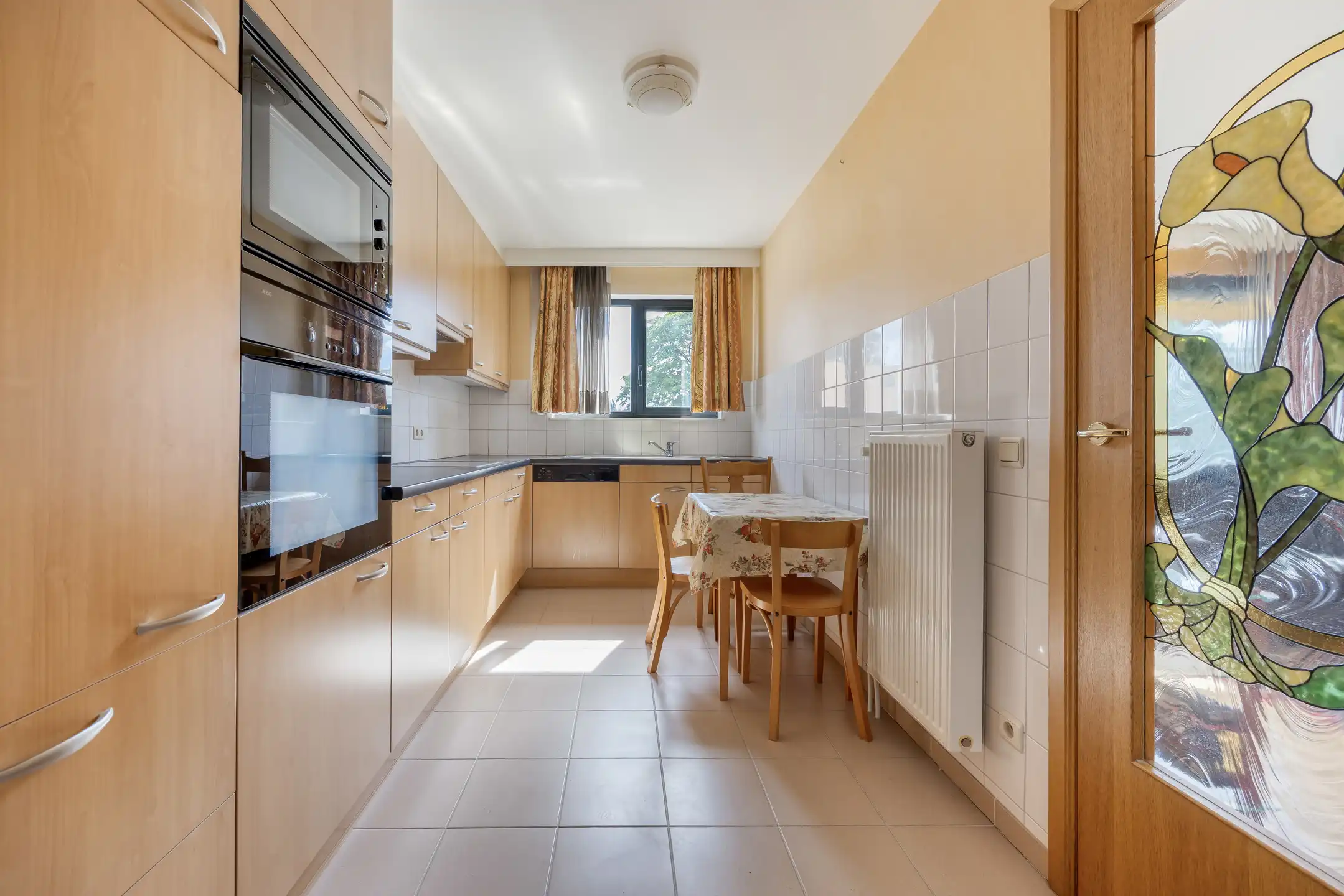 Mooi appartement op een 1v met 3 slaapkamers en terras en garage foto 9