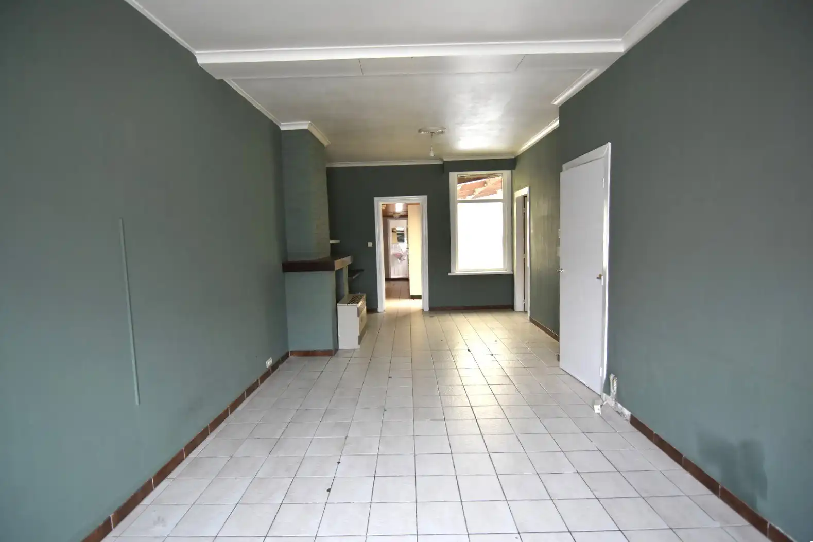 Te renoveren rijwoning met goeie ligging foto 4