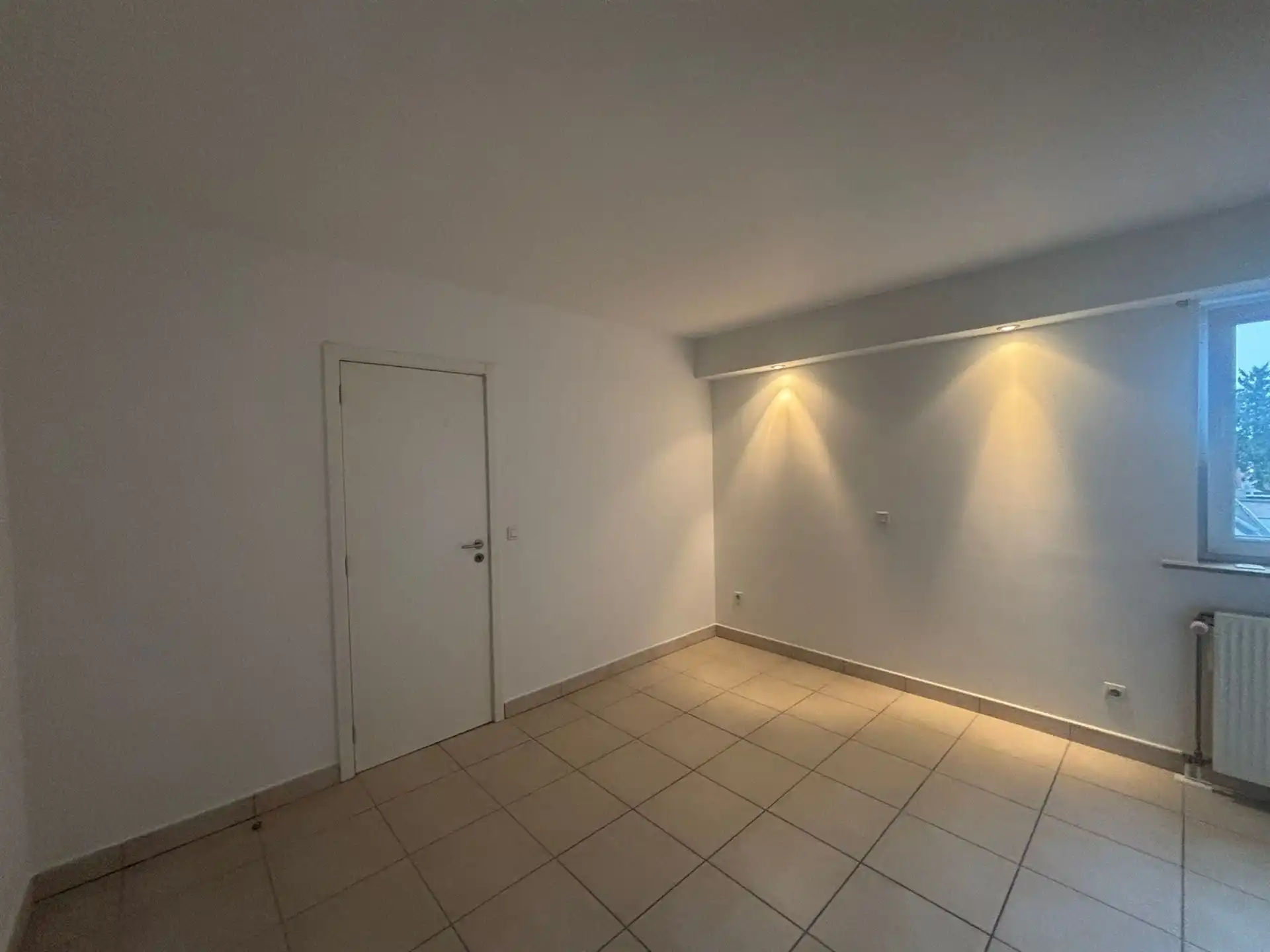 Duplex-appartement met extra zolderkamer + garagebox in het centrum! foto 8