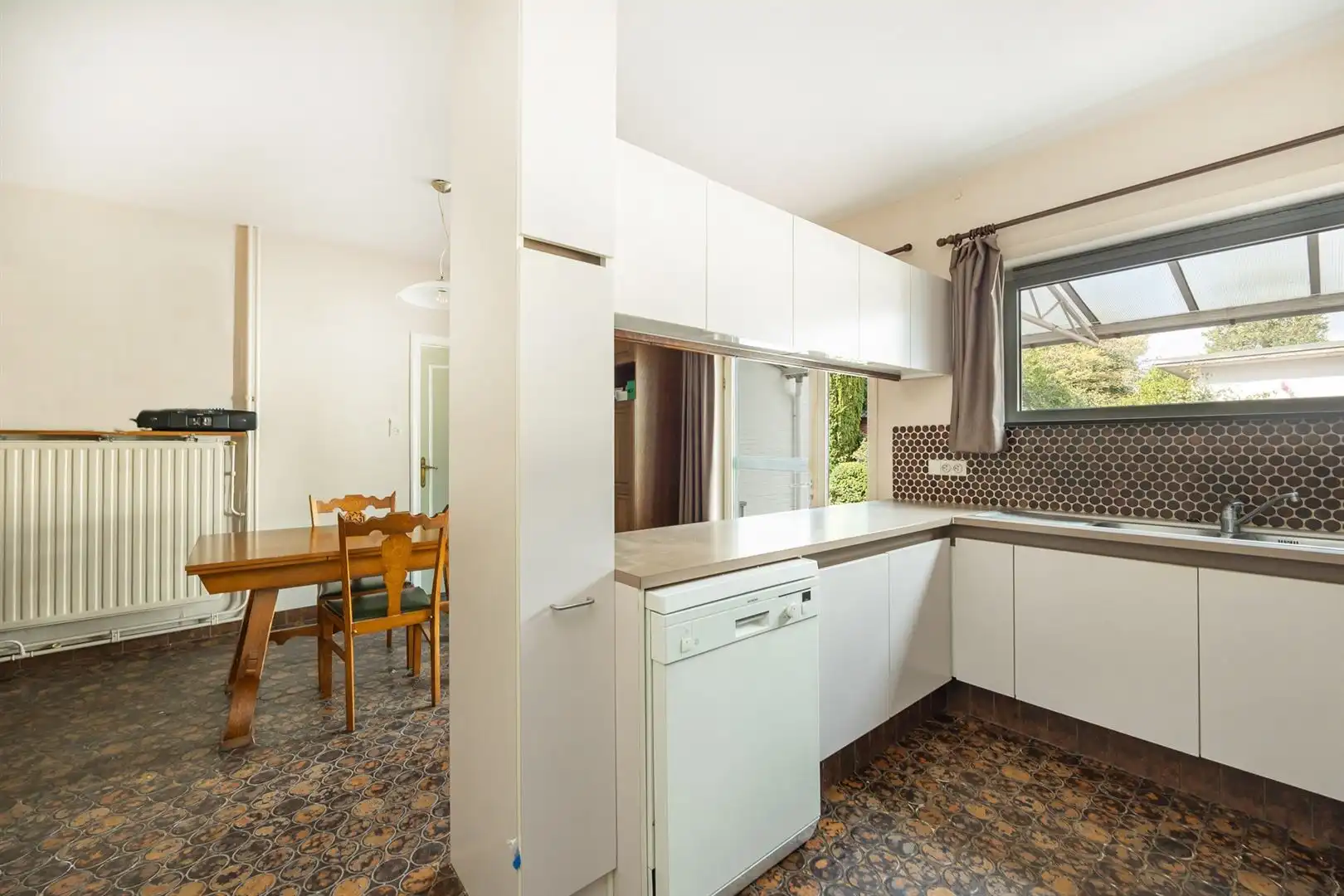 Woning met veel potentieel en grote tuin! foto 8