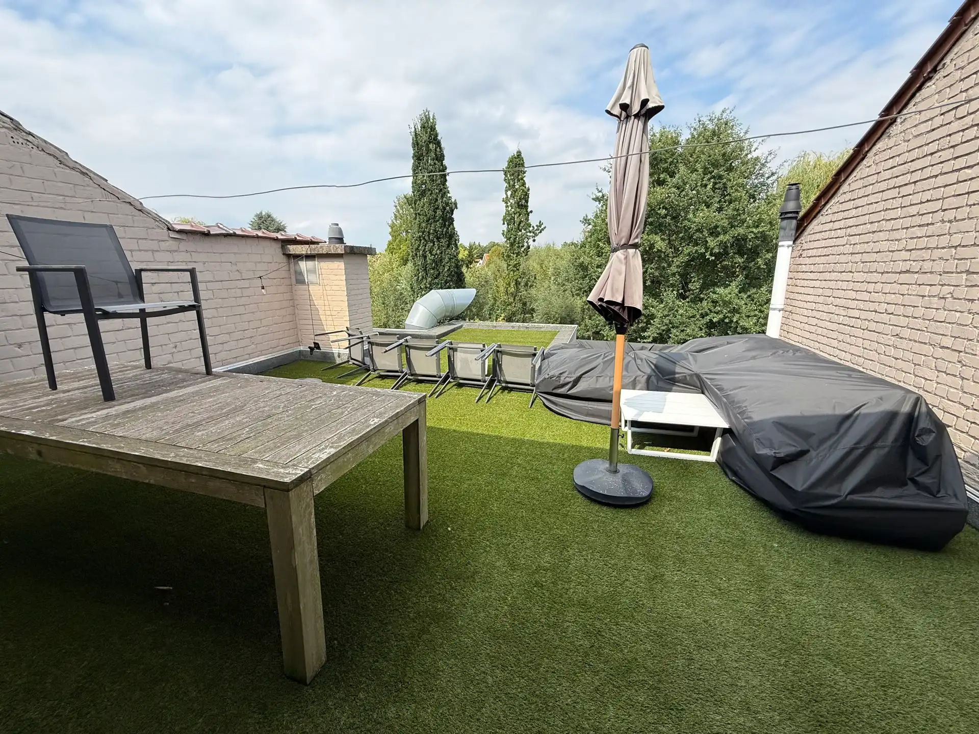 Duplex met 2 terrassen en tuin foto 11
