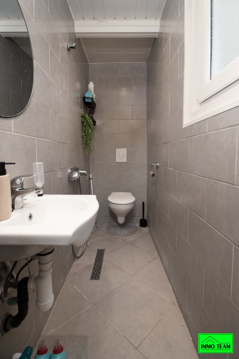 Opbrengsteigendom met handelszaak en 2 duplexappartementen foto 8