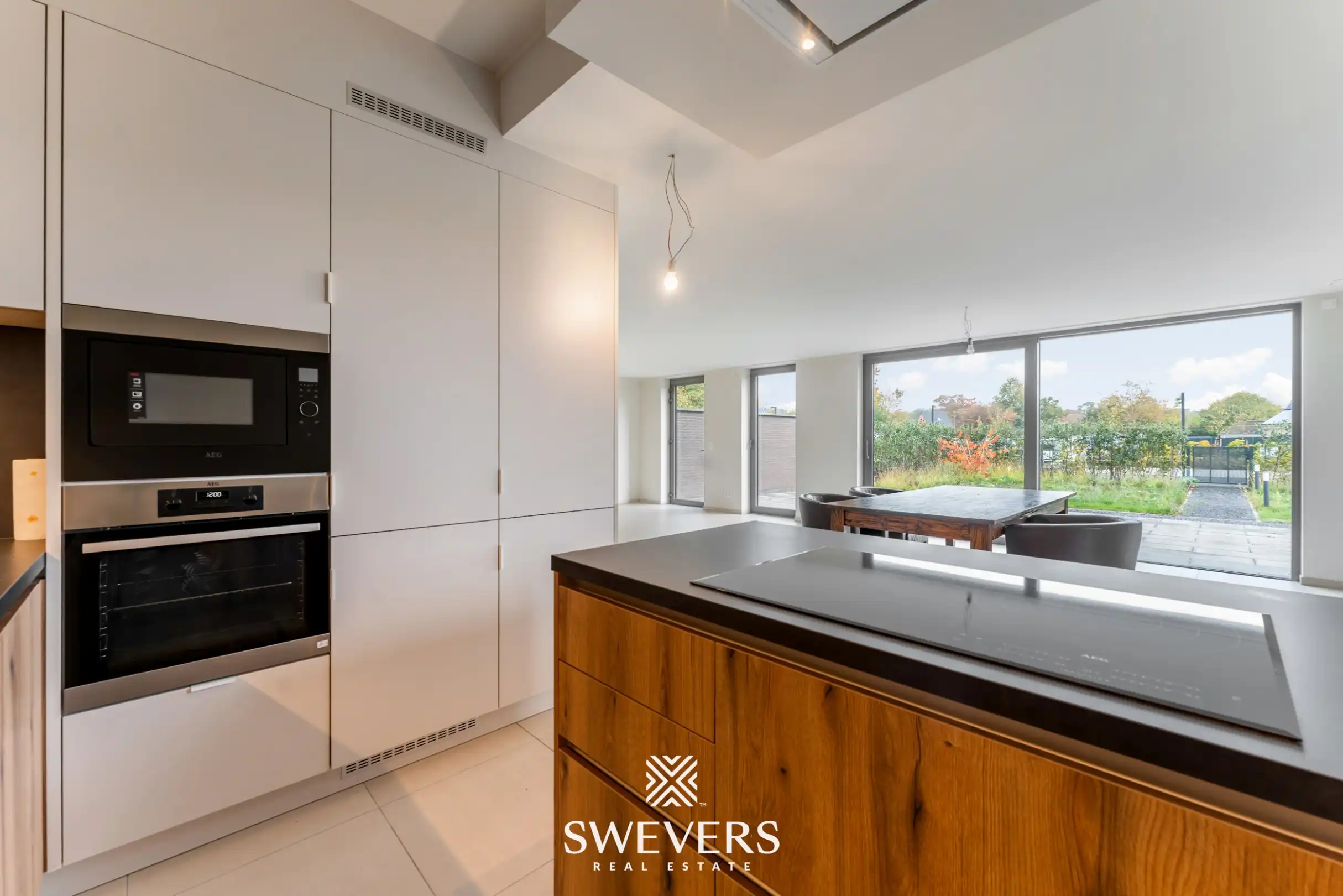 Stijlvol, gelijkvloers en instapklaar appartement (208 m²) mét private tuin en private kelder vlakbij Zolder-centrum foto 11