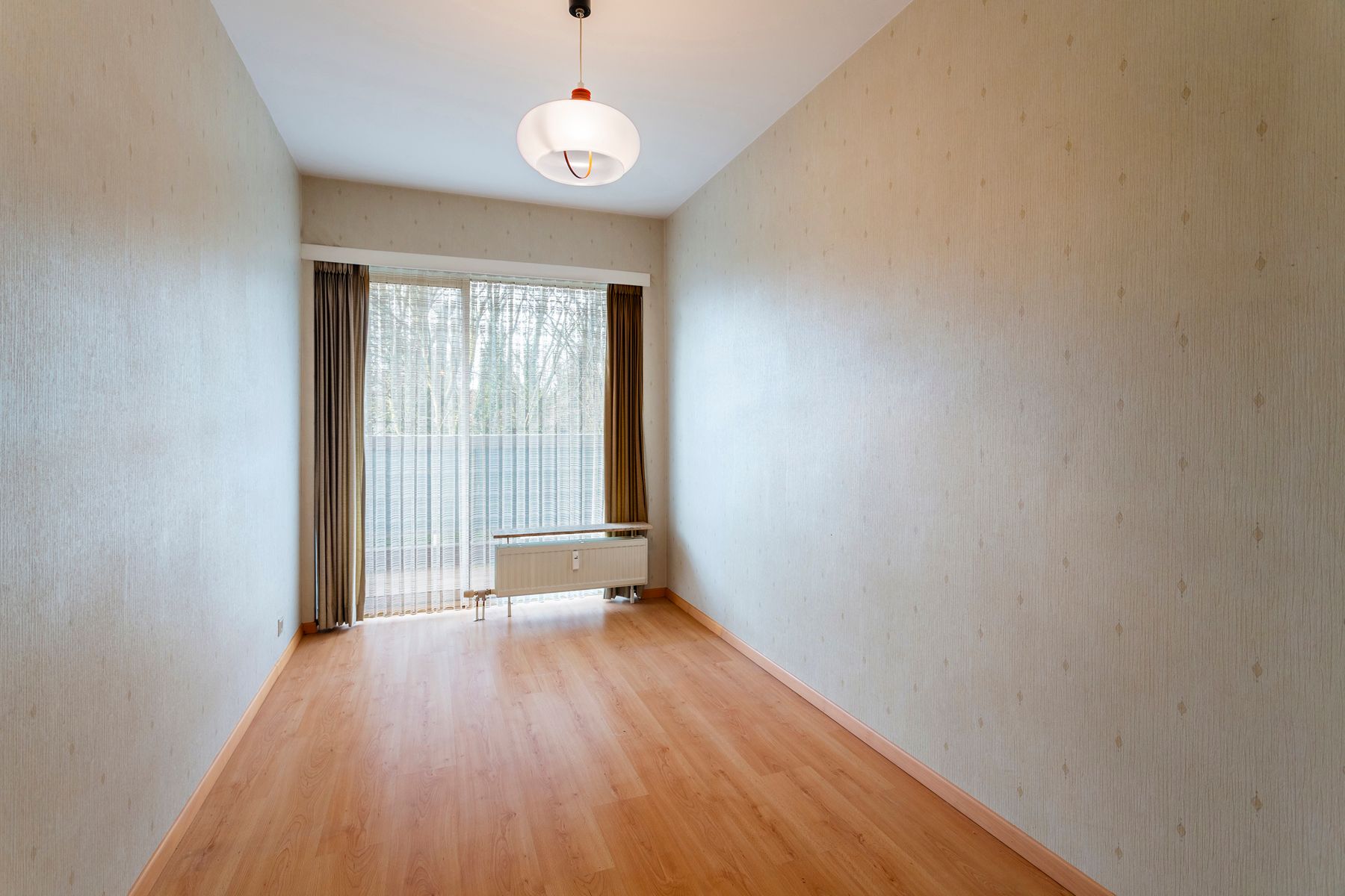 Lichtrijk appartement in het groen met renovatiepotentieel foto 11