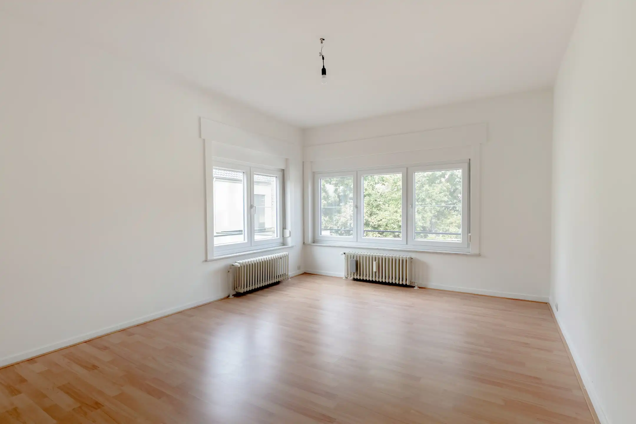 Vernieuwd 2-slaapkamer hoekappartement (98 m²) met garagebox foto 7