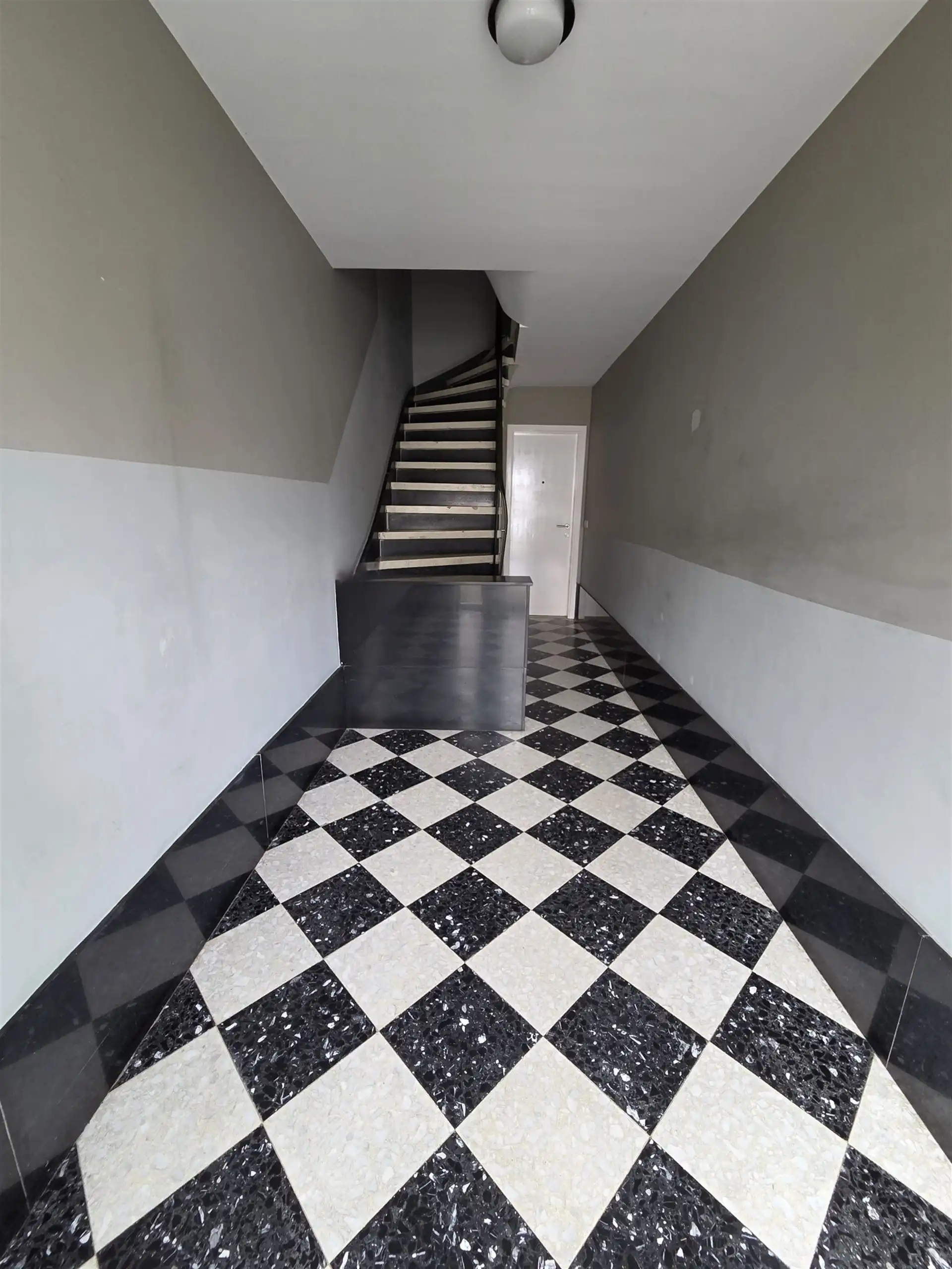 Instapklaar gelijkvloers appartement met zonnige tuin foto 10