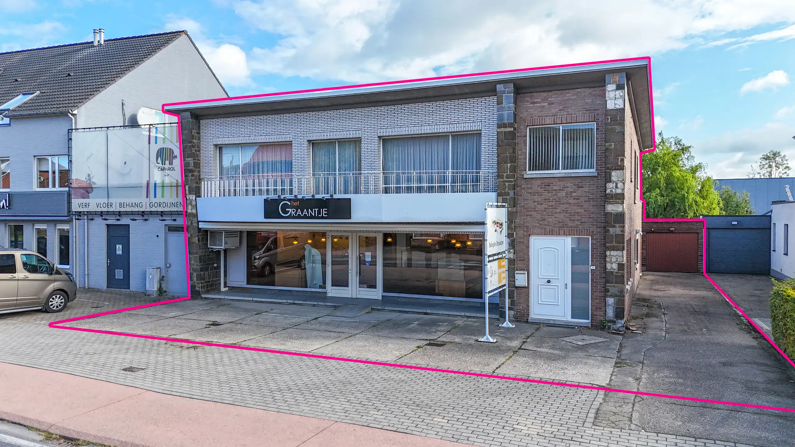 Te koop: Handelspand met appartement in hartje Alken  foto {{pictureIndex}}