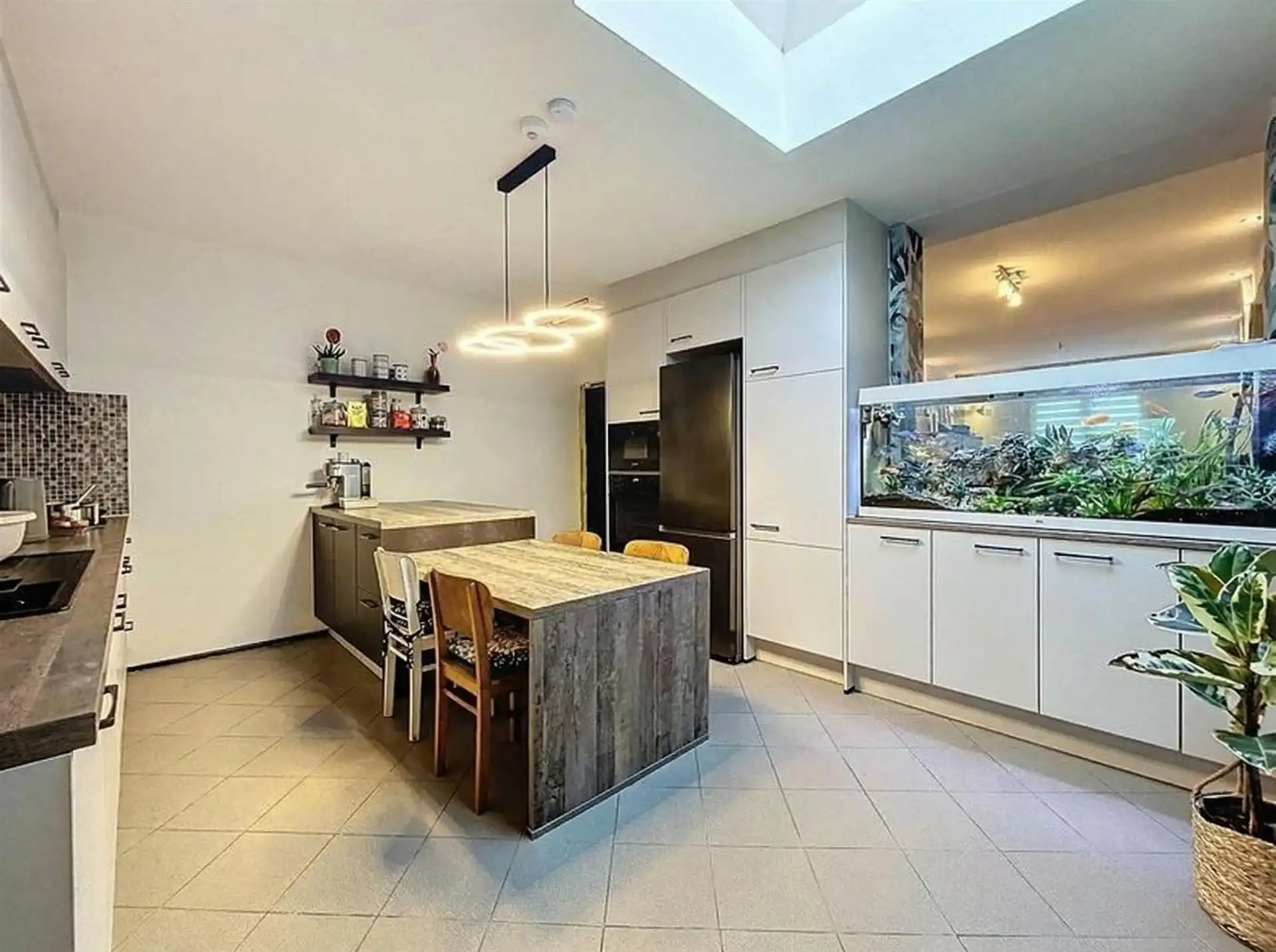 instapklare woning met 3 slaapkamers en half open karakter op perceel van 200m² foto 4