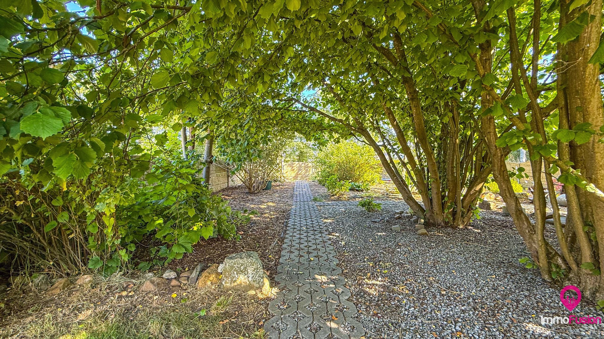 Praktische bungalowwoning met prachtige tuin en zwemvijver! foto 48