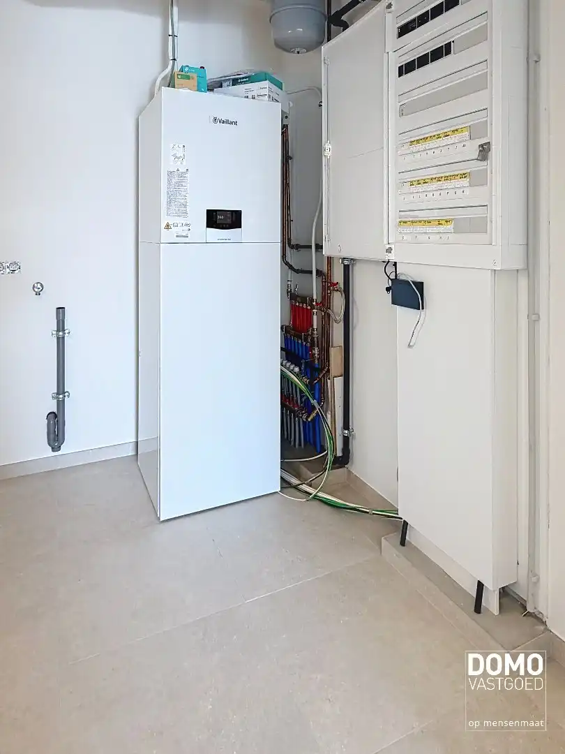 HOOGWAARDIG AFGEWERKT APPARTEMENT VAN 122,50 M² MET 2 SLAAPKAMERS, RUIM TERRAS EN PARKEERPLAATS TE CENTRUM TUILT foto 9