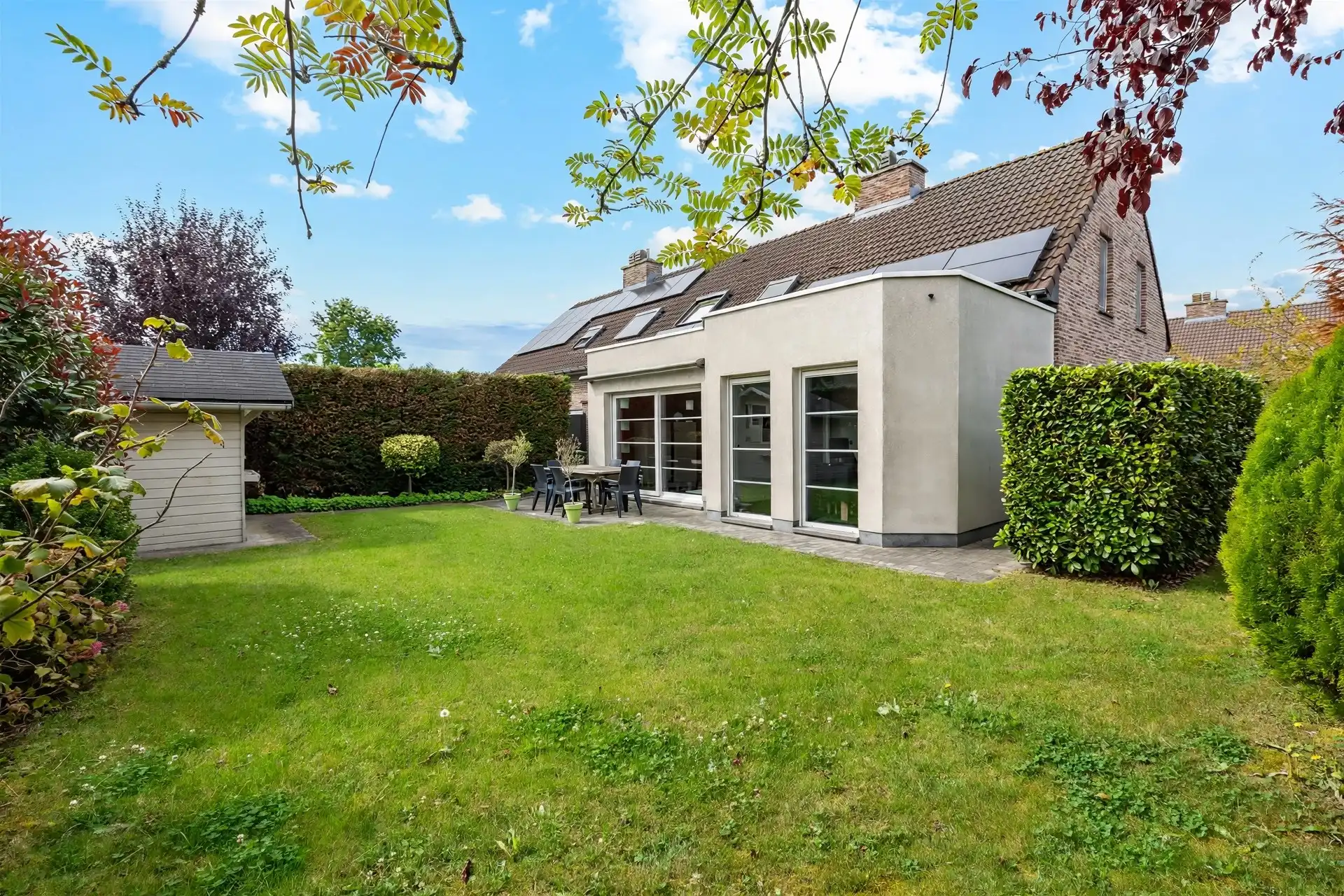 Gezinswoning met 4 slaapkamers en zonnige tuin in Belsele. foto {{pictureIndex}}