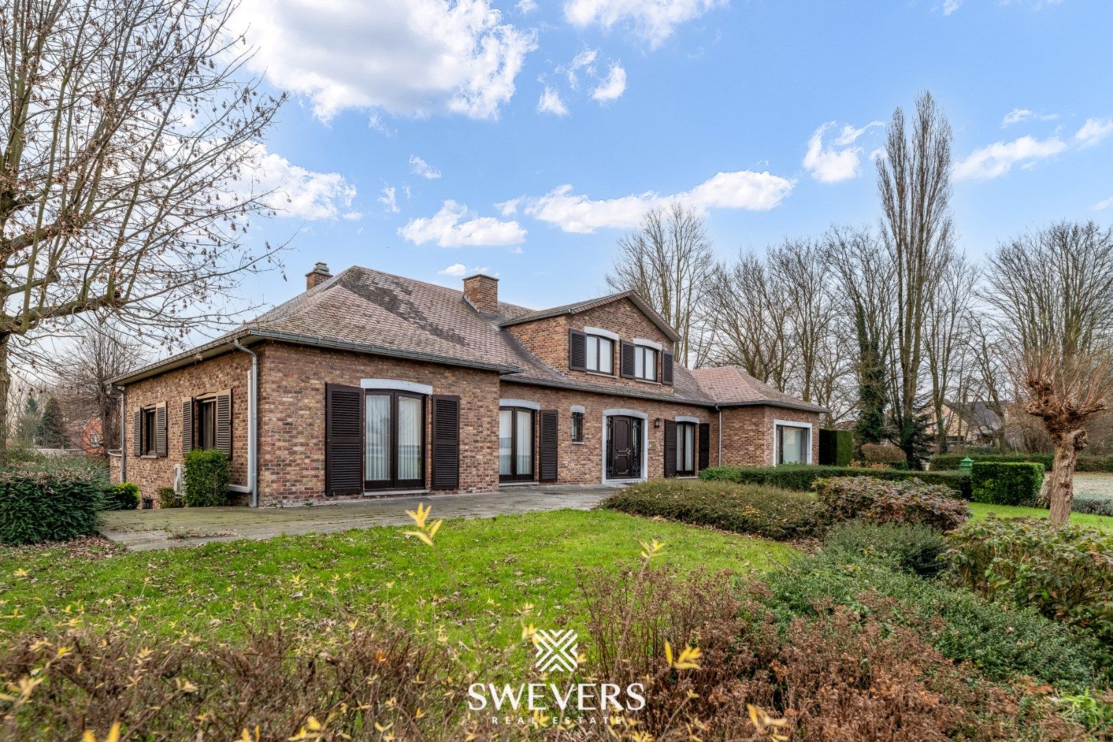 Hoofdfoto van de publicatie: Exclusieve villa met grandeur en potentieel in Tongeren