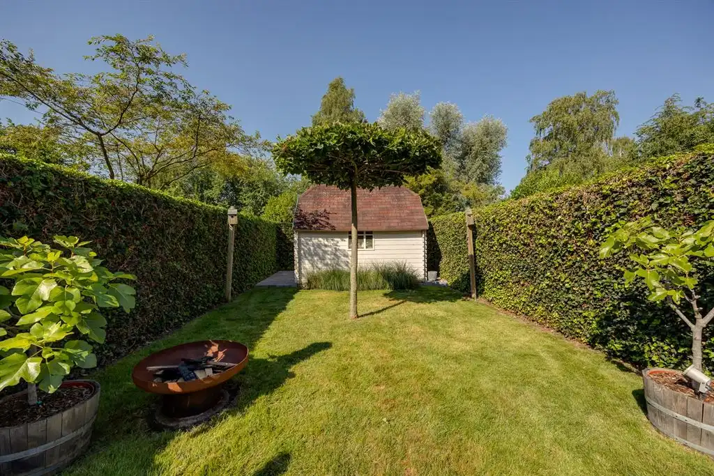 Instapklare gezinswoning met groene tuin foto 7