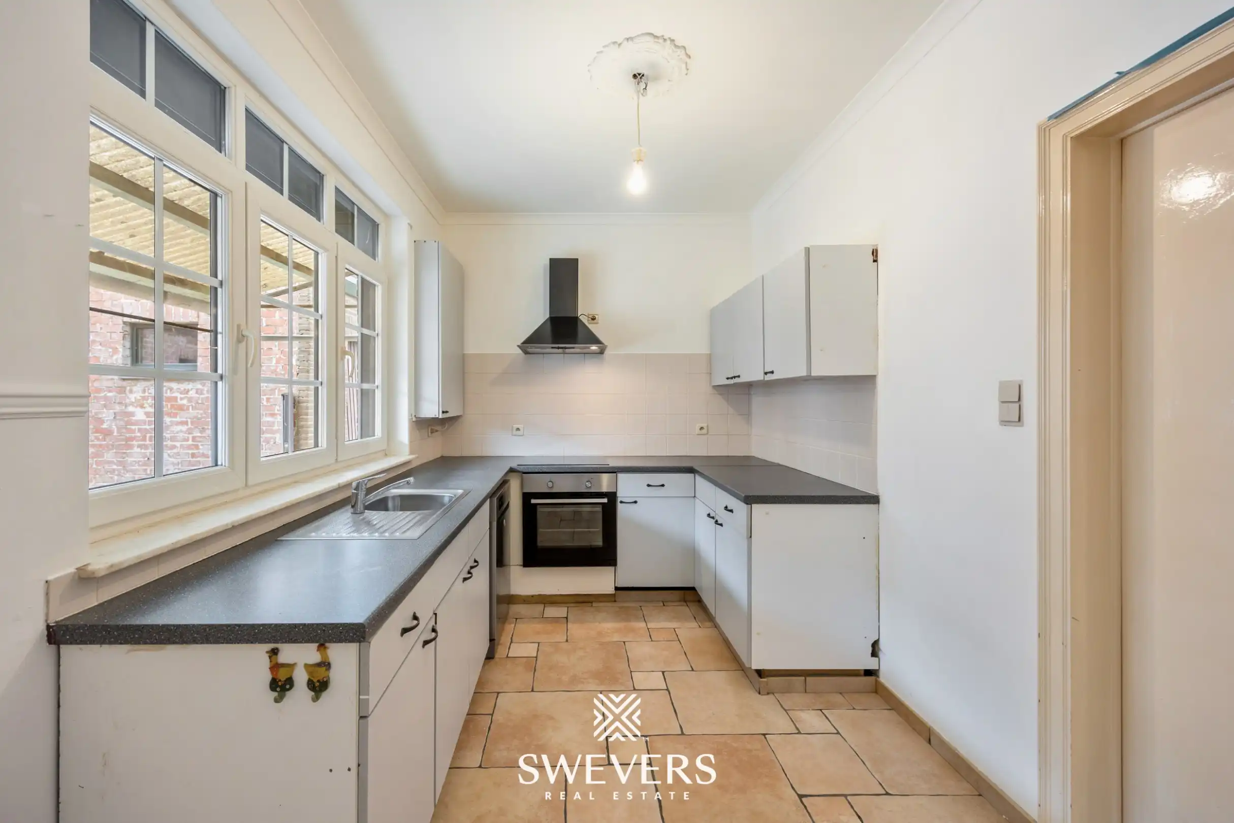 Instapklare woning met 5 slaapkamers en EPC B op rustige en centrale ligging in Tongeren foto 9