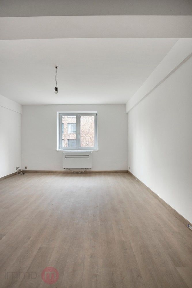 Volledig vernieuwde, instapklare studio in hartje Leuven met afgesloten garagebox – rustig gelegen pareltje! foto 11