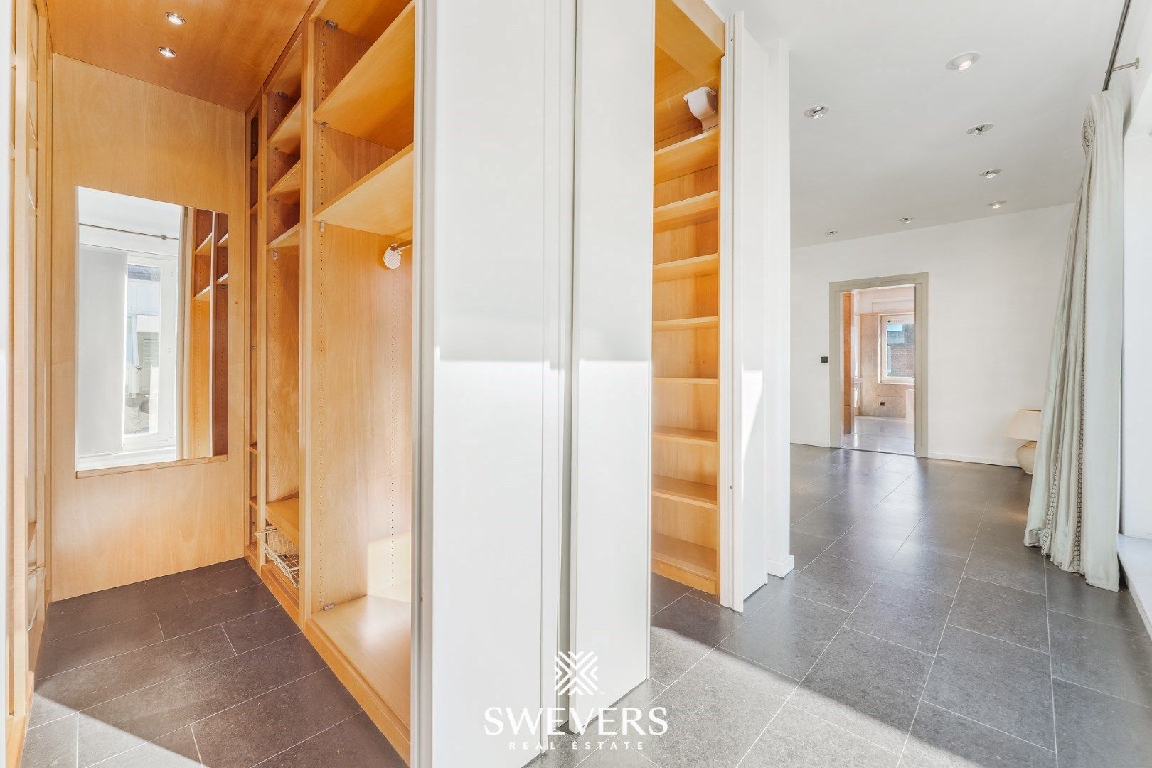 Handelspand met ruime woning in hartje Lummen – een unieke opportuniteit foto 16