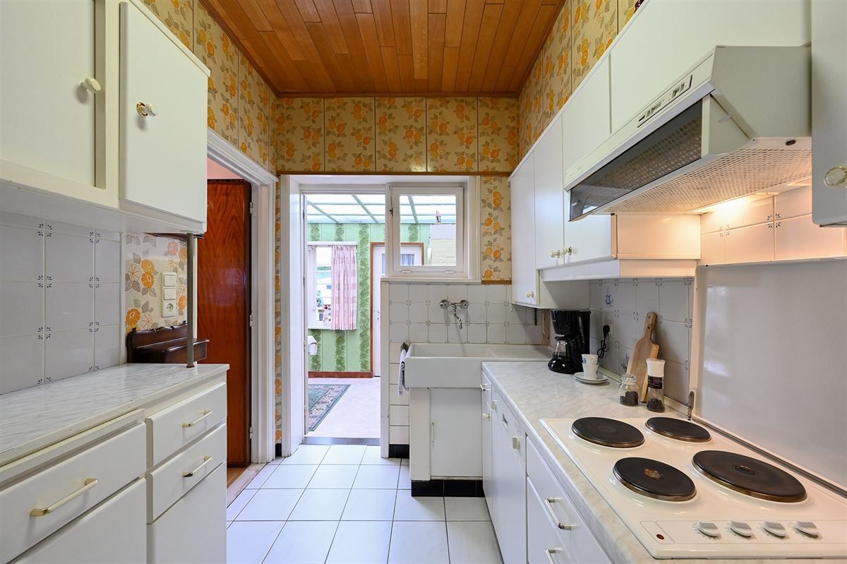 Te renoveren halfopen woning met potentieel foto 11