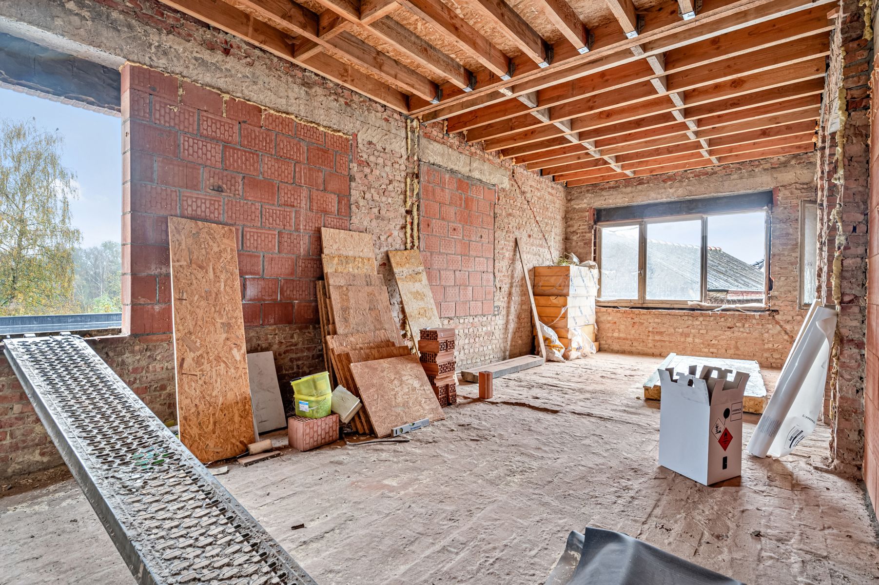 Uniek renovatieproject vergund voor twee villa-appartementen foto 14