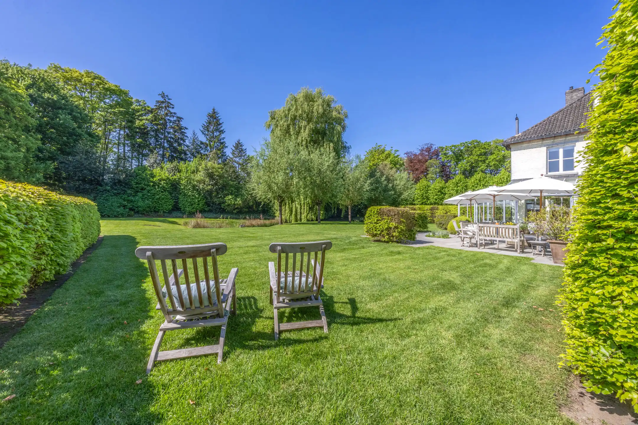 Unieke parel op royaal perceel (3.877 m²) met bouwgrond foto 36