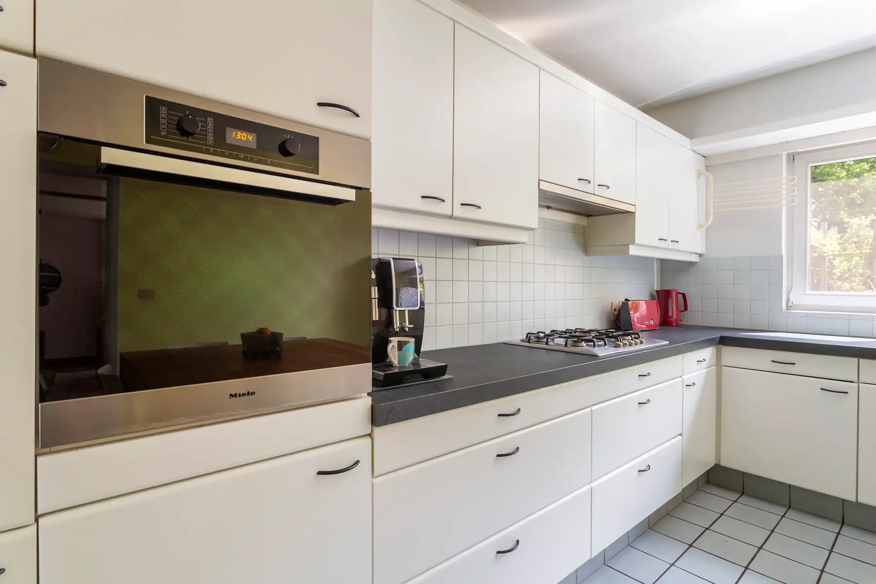 Ruime gezinswoning met zonnige tuin op toplocatie! foto 12