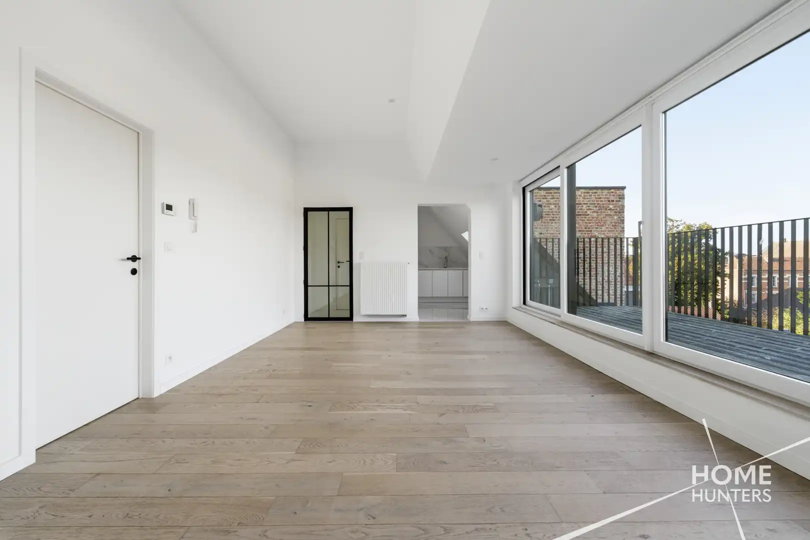Ruim dakappartement met royaal terras en een schitterend uitzicht over Ieper foto 6