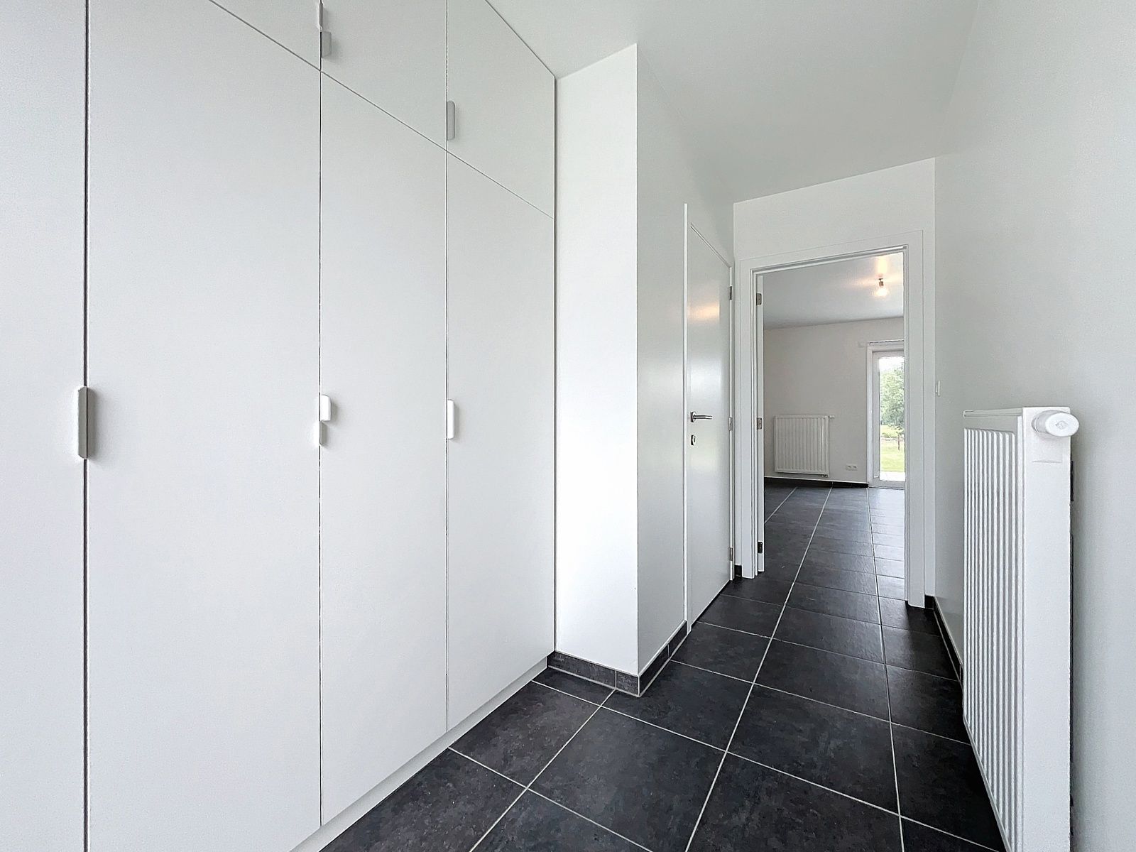 Halfopen nieuwbouwwoning + 3 slpks + tuin  foto 2