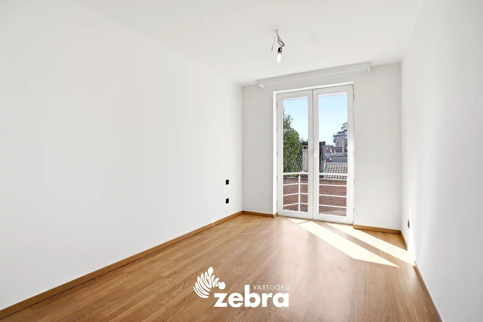 Zeer ruim appartement (137 m²) te koop met dubbele garage in het hartje van Tielt! foto 18