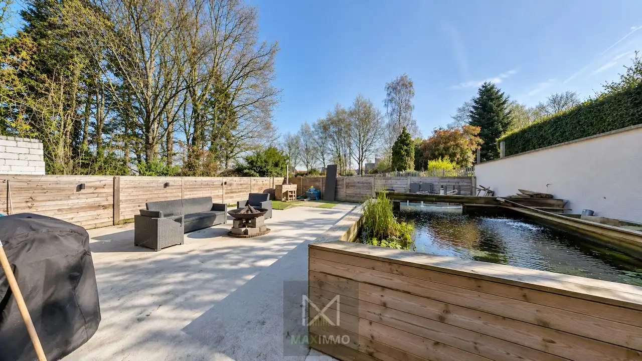 Volledig instapklare gelijkvloerse eigendom met loods van 180 m² op topligging foto 14