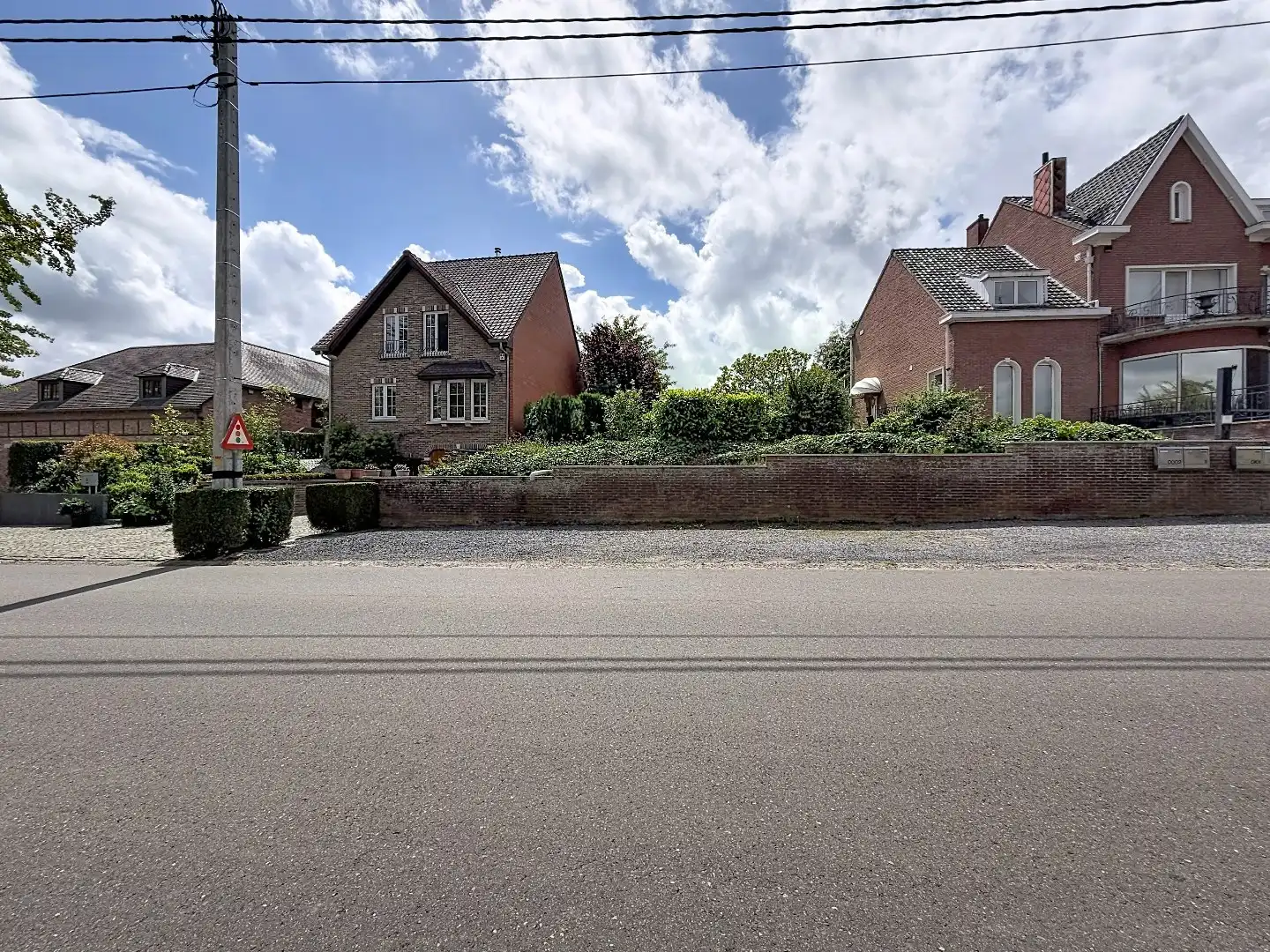 Exclusieve eigendom met handelsruimte, opbrengstappartementen en bouwgrond op toplocatie in Landen foto 2