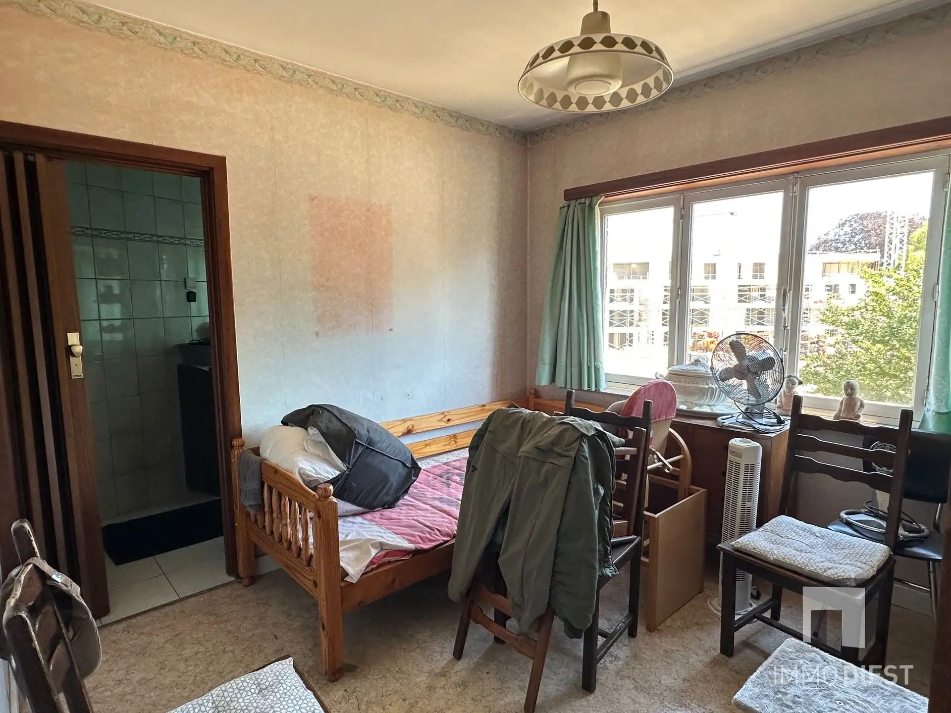 Te renoveren woning met 3 slaapkamers, 2 garages en tuin in Diest foto 16