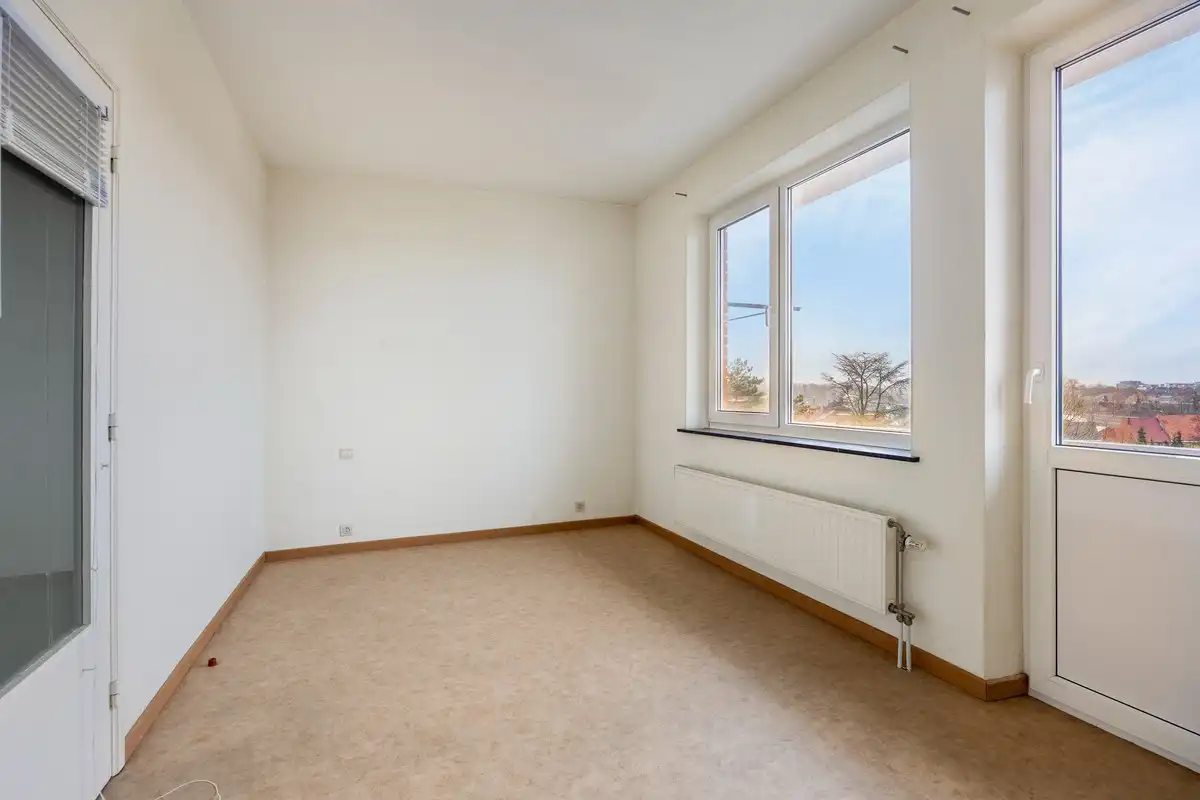 Ruim appartement met twee slaapkamers en garagebox aan de stadsrand foto 11