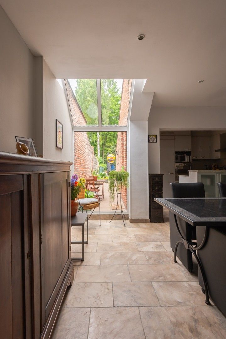 Charmante woning met groene tuin in het hart van Schoten foto 10