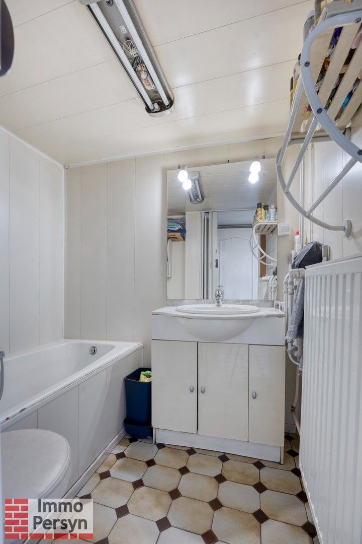 Charmante te moderniseren woning met nieuwe keuken op toplocatie in Scherpenheuvel-Zichem foto 11