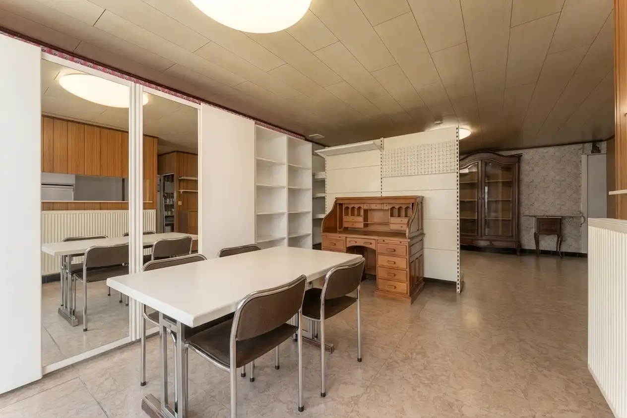 Unieke handelswoning met uitstekend draaiende winkel in centrum Beveren! foto 13