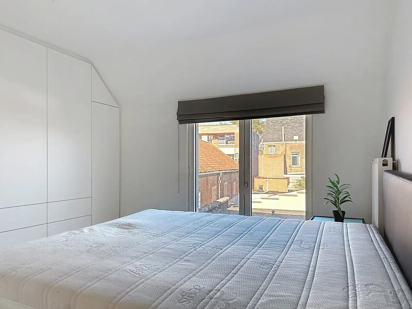 Instapklare, gerenoveerde woning met gezellige koer in hartje Niel! foto 24