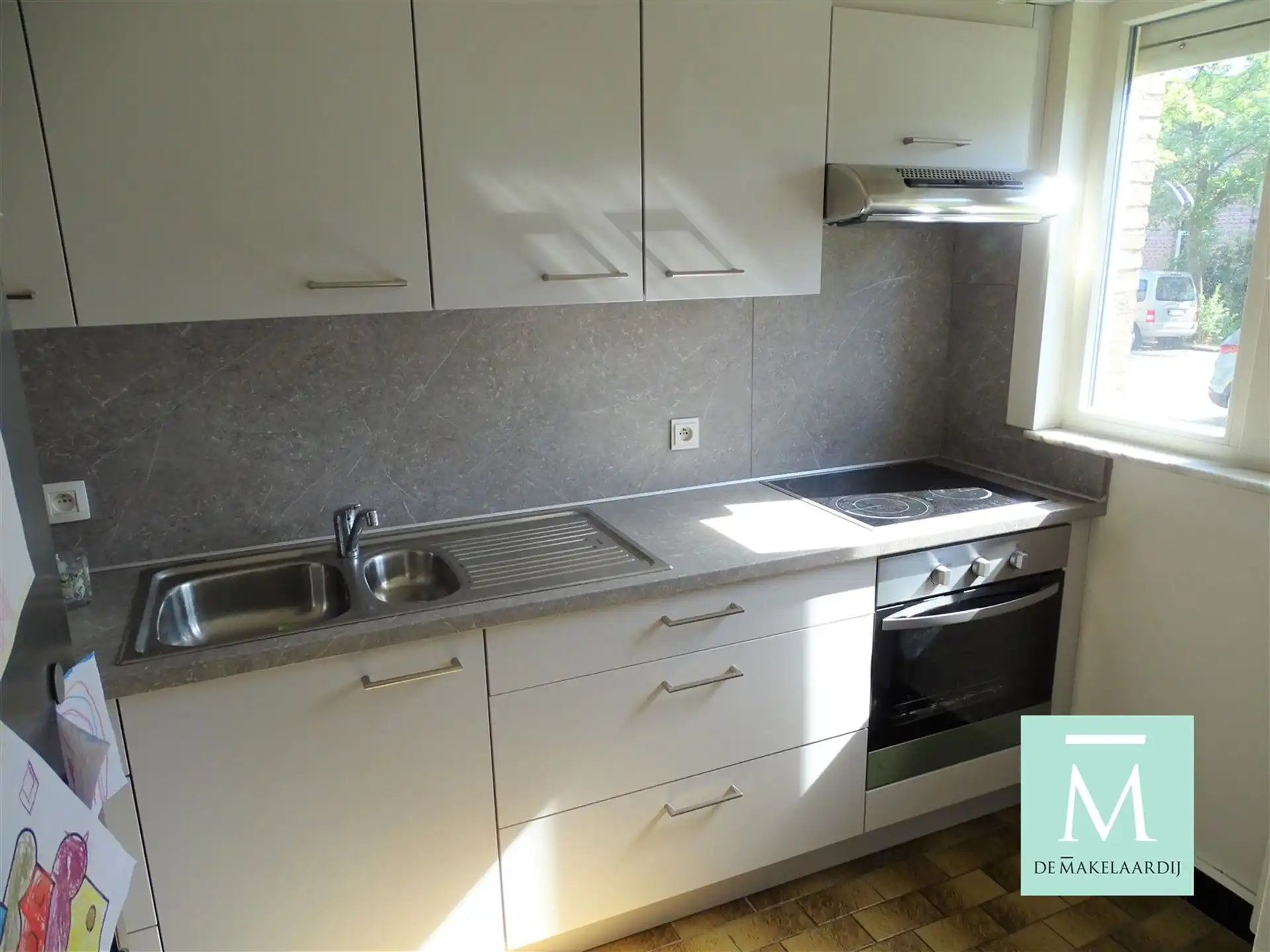 Centraal gelegen gelijkvloersappartement met 2 slaapkamers en tuin! foto 3