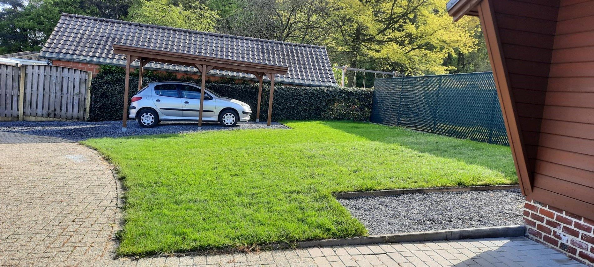 Gelijkvloerse gezinswoning met 3 slaapkamers, fraaie tuin en carport in Opoeteren. foto 15