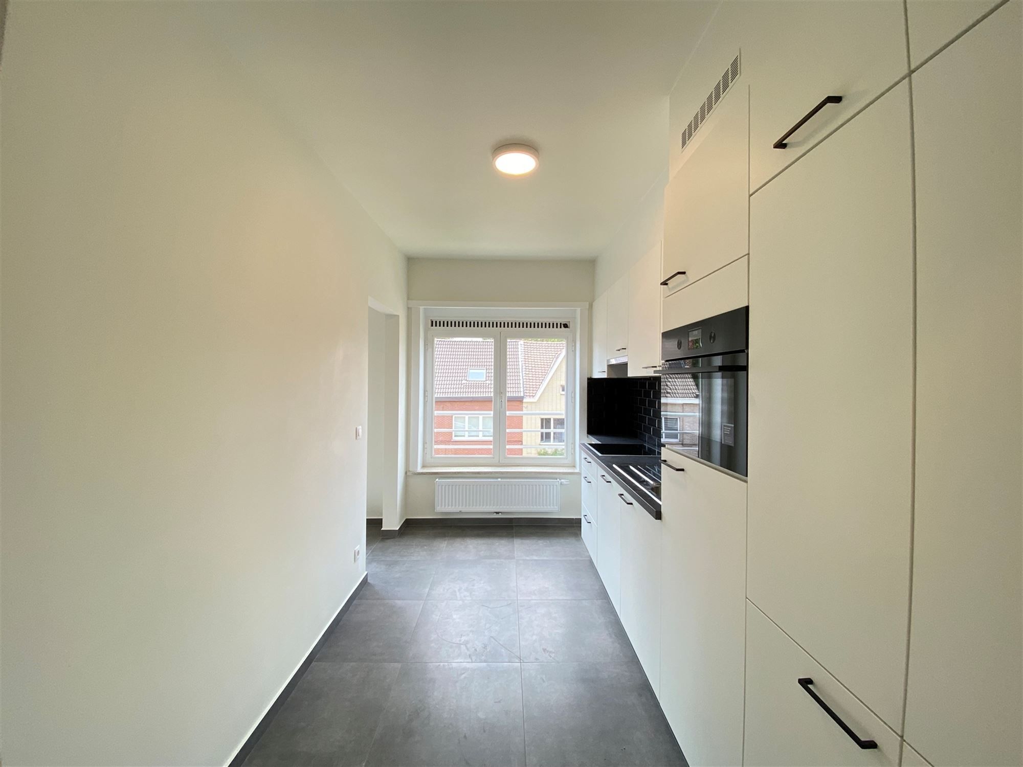 Gerenoveerd appartement met garagebox te Wondelgem  foto 3