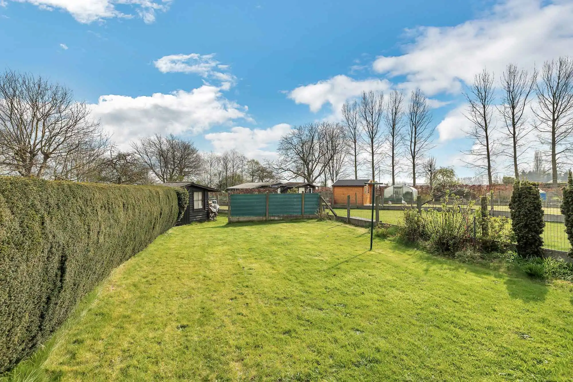 Goed onderhouden woning met garage en tuin foto 23